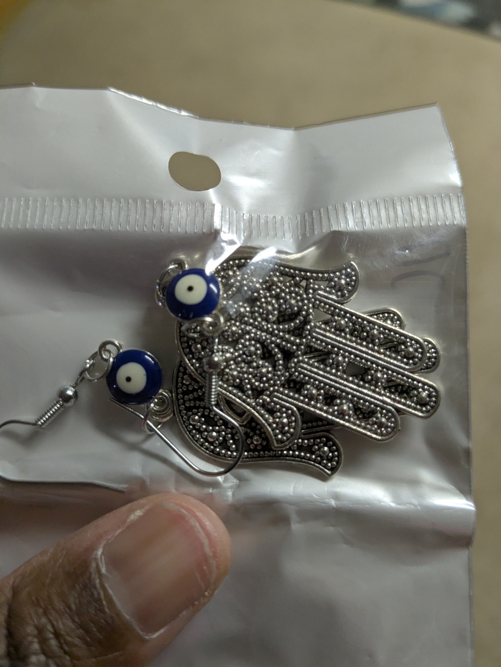 Silver Hamsa Hand Earrings with Blue Evil Eye Beads